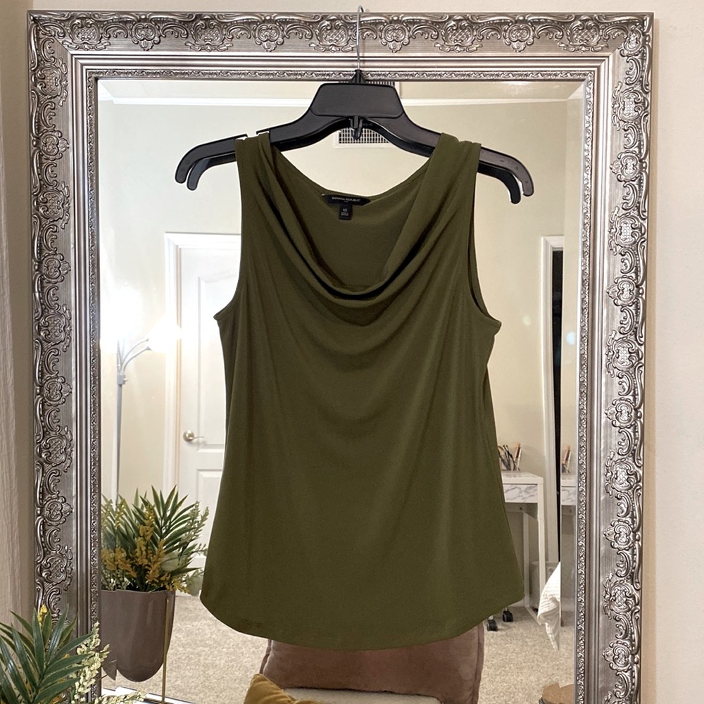 Stretchy, olive green, cowl neck top. No tags attached, but never worn. :)
